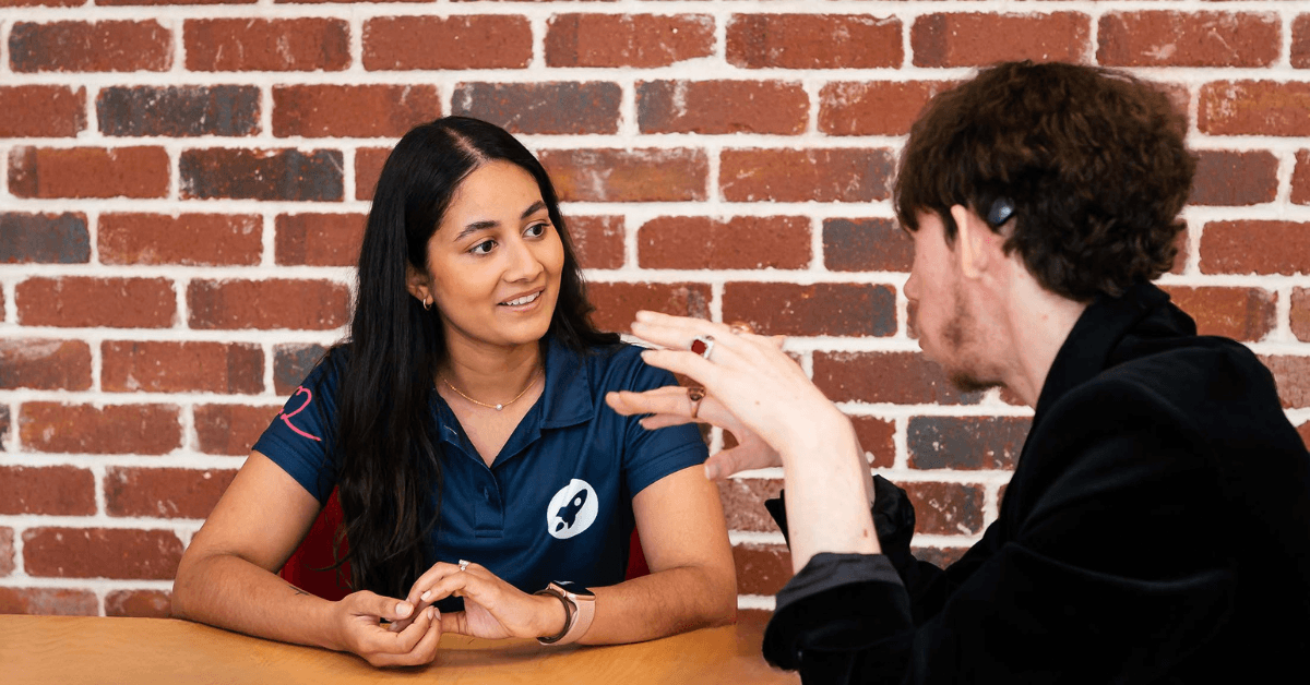 Clinician & client discussing their therapy