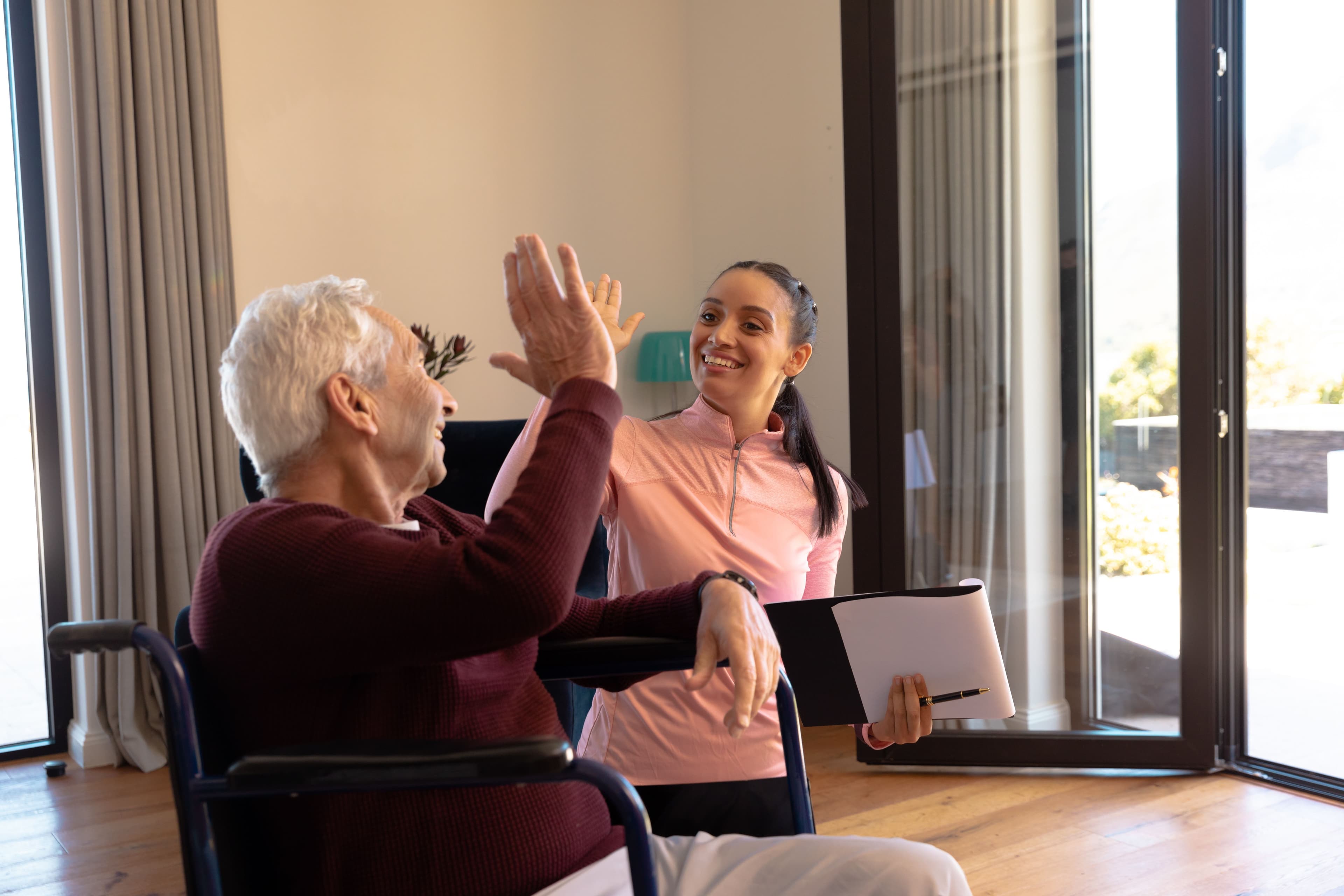 Clincian and aged care client completing an assessment