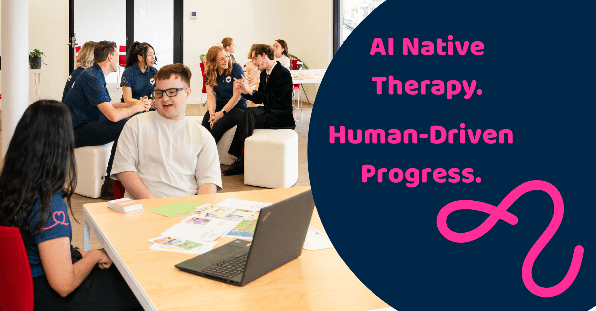 A group of people sitting around a table having a discussion. There is a caption in the image of AI Native Therapy. Human Driven Progress